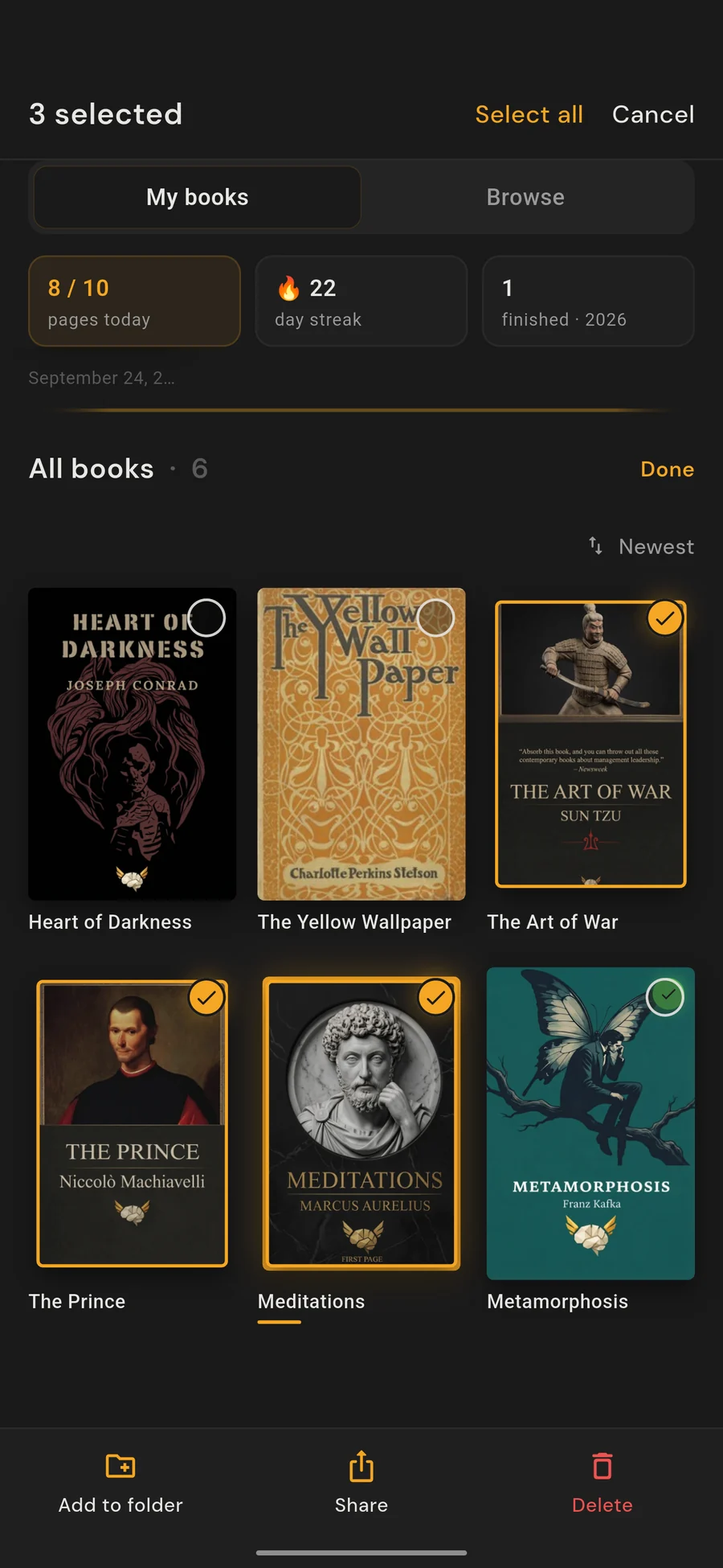 Manage mode: three books selected, with Add to folder, Share and Delete